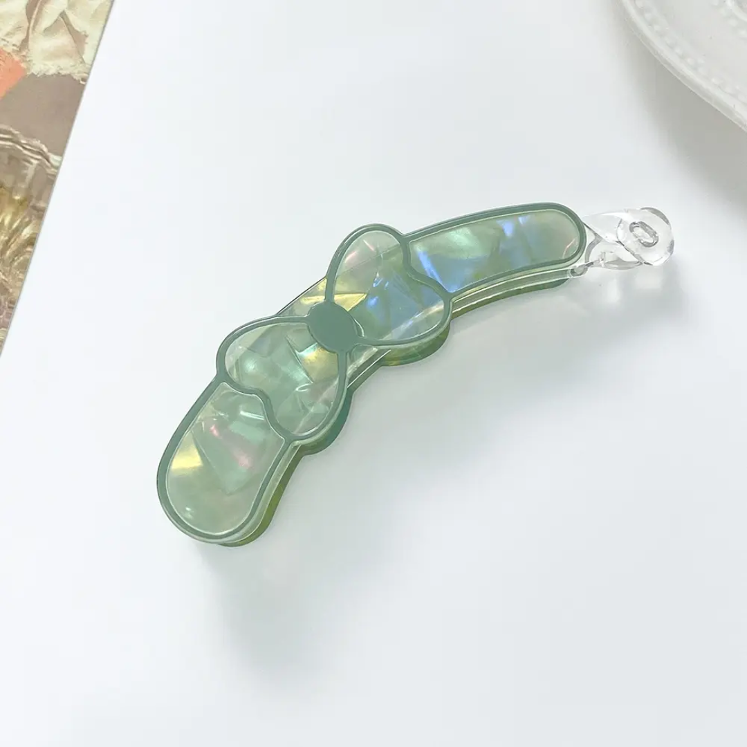 The Lumina Iridescent Bow Banana Clip