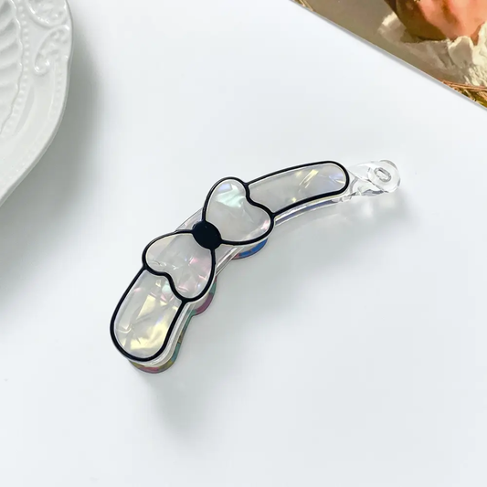 The Lumina Iridescent Bow Banana Clip