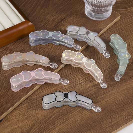 The Lumina Iridescent Bow Banana Clip