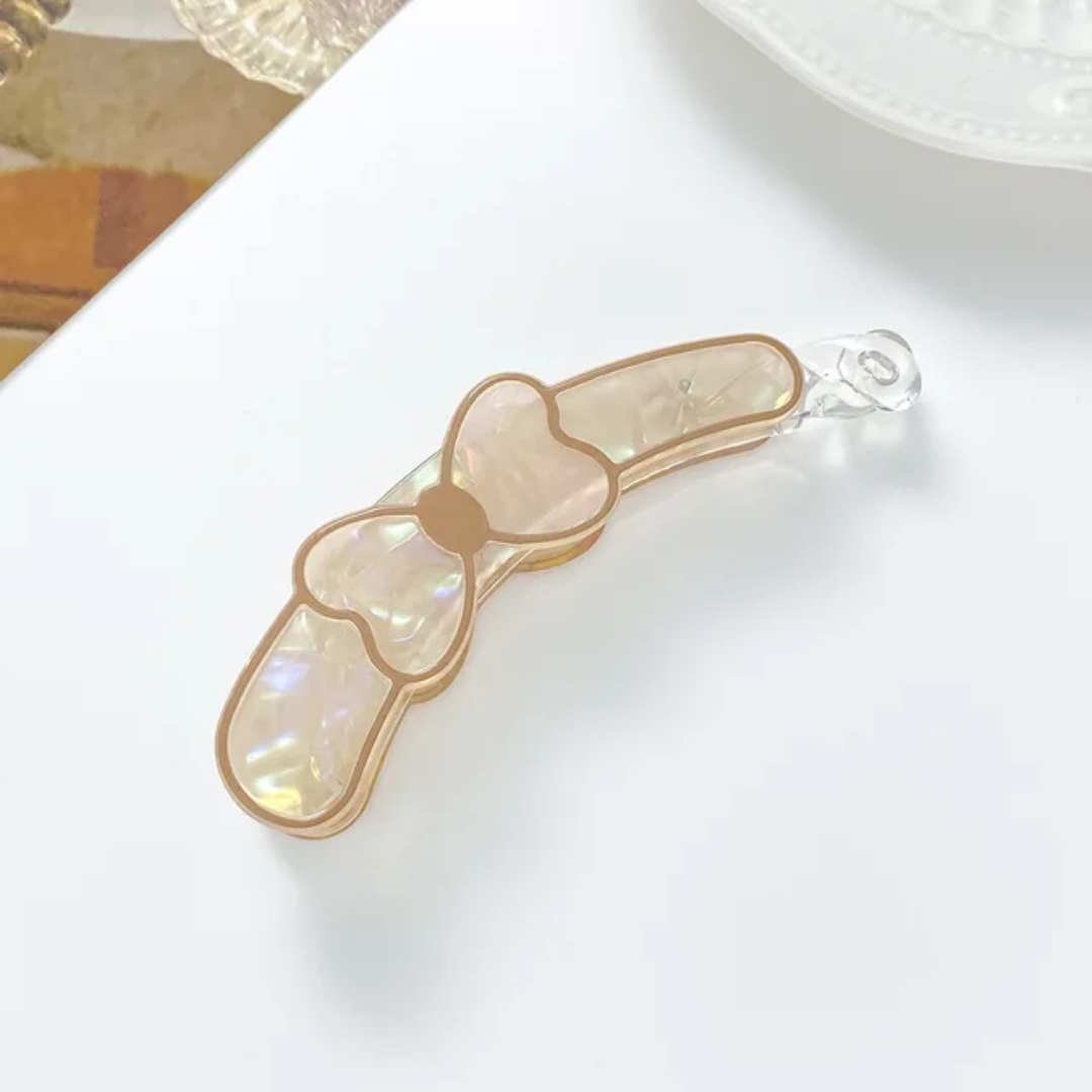 The Lumina Iridescent Bow Banana Clip